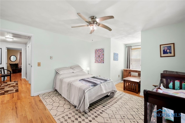 229 Hawthorn Dr, Archbold, OH 43502 - bedroom with light wood-style floors and a ceiling fan