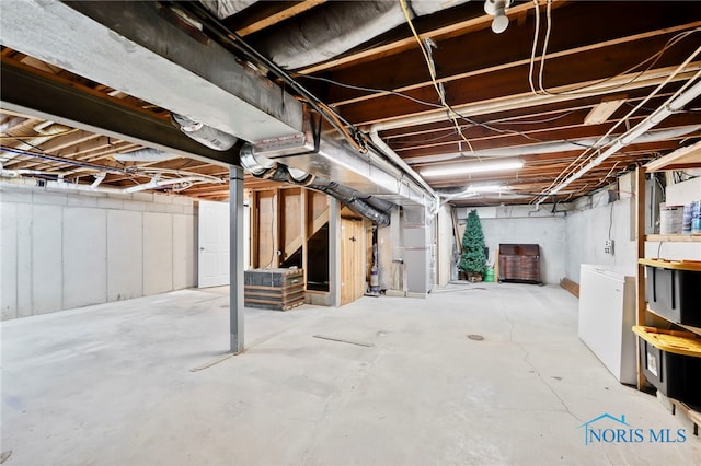 229 Hawthorn Dr, Archbold, OH 43502 - unfinished below grade area with fridge