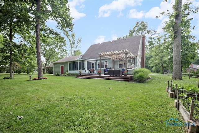 229 Hawthorn Dr, Archbold, OH 43502 - rear view of property featuring a pergola, a wooden deck, a yard, and a chimney