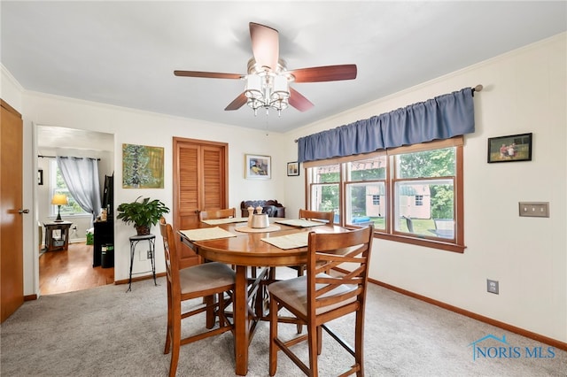 229 Hawthorn Dr, Archbold, OH 43502 - dining area with light colored carpet, plenty of natural light, and ceiling fan