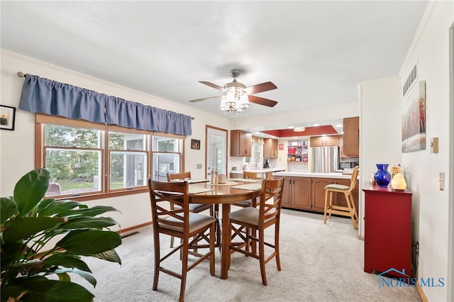 229 Hawthorn Dr, Archbold, OH 43502 - dining space with light carpet and a ceiling fan