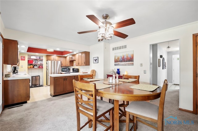 229 Hawthorn Dr, Archbold, OH 43502 - dining room with a ceiling fan and light colored carpet