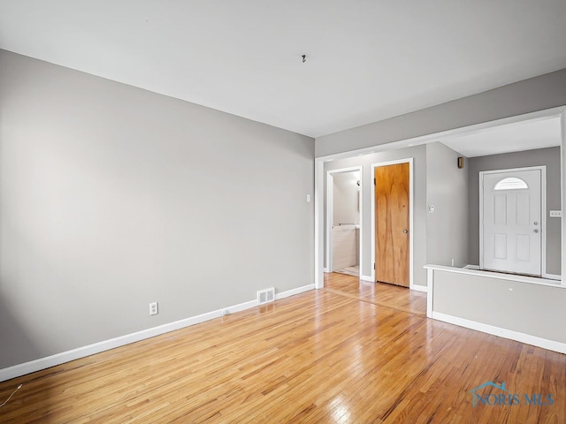 1242 Holgate Ave, Maumee, OH 43537 - empty room with baseboards and light wood-style flooring