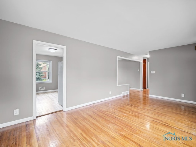 1242 Holgate Ave, Maumee, OH 43537 - empty room with light wood-type flooring and baseboards
