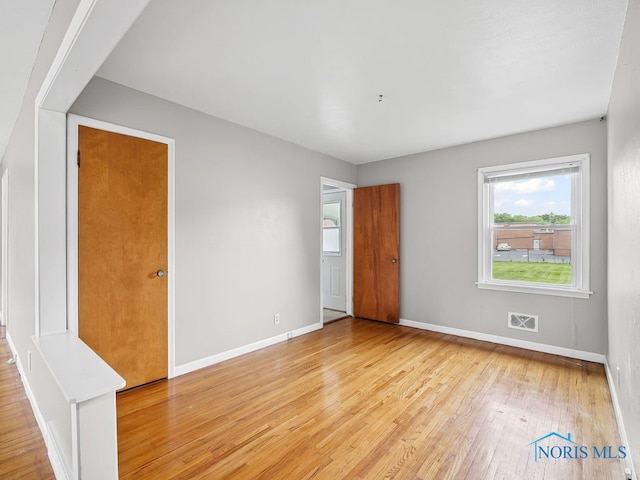 1242 Holgate Ave, Maumee, OH 43537 - spare room featuring light wood-style flooring and plenty of natural light