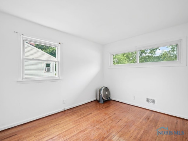 1242 Holgate Ave, Maumee, OH 43537 - empty room with wood finished floors and baseboards