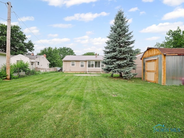 1242 Holgate Ave, Maumee, OH 43537 - view of yard with a storage shed