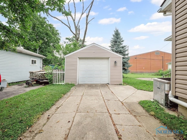 1242 Holgate Ave, Maumee, OH 43537 - detached garage featuring concrete driveway
