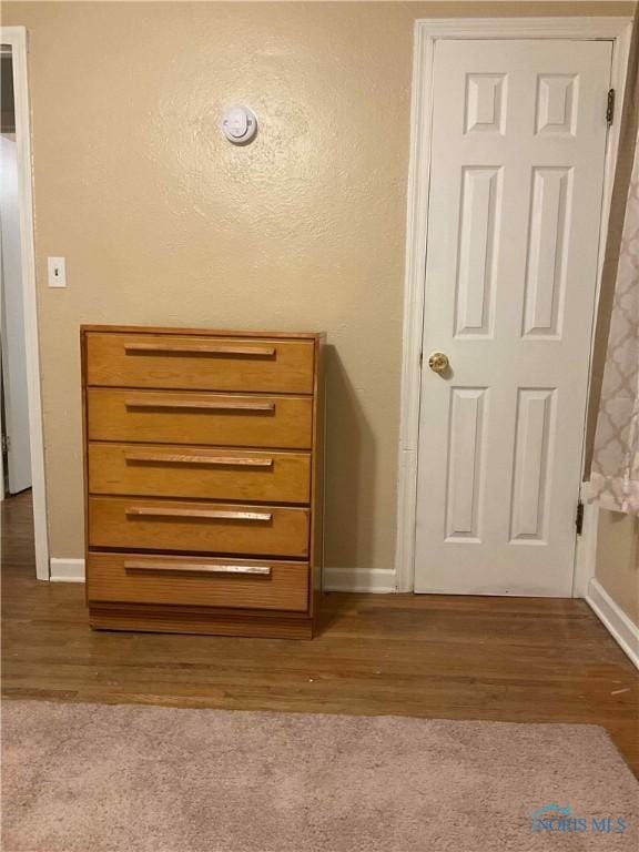 2127 Perth St, Toledo, OH 43607 - detailed view of baseboards and wood finished floors