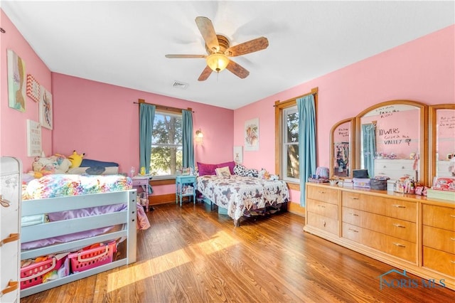 22804 State Route 2, Archbold, OH 43502 - bedroom with wood finished floors and a ceiling fan