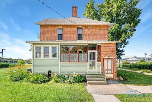 22804 State Route 2, Archbold, OH 43502 - view of front of house with a front yard and a chimney