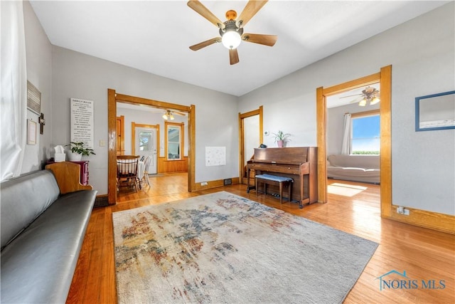 22804 State Route 2, Archbold, OH 43502 - living area with a ceiling fan and wood finished floors