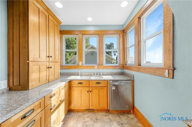 22804 State Route 2, Archbold, OH 43502 - kitchen featuring stainless steel dishwasher and light stone counters