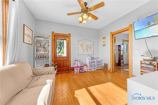 22804 State Route 2, Archbold, OH 43502 - living area with wood finished floors and ceiling fan