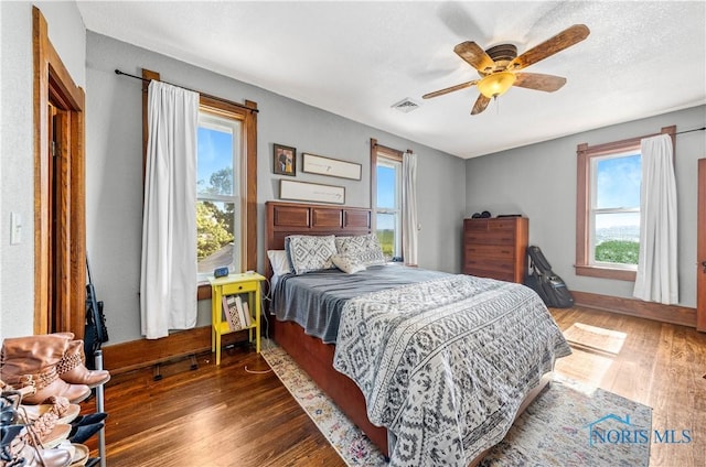 22804 State Route 2, Archbold, OH 43502 - bedroom featuring wood finished floors and ceiling fan