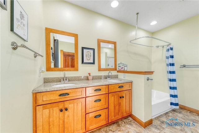 22804 State Route 2, Archbold, OH 43502 - full bathroom featuring shower / tub combo with curtain, double vanity, and recessed lighting