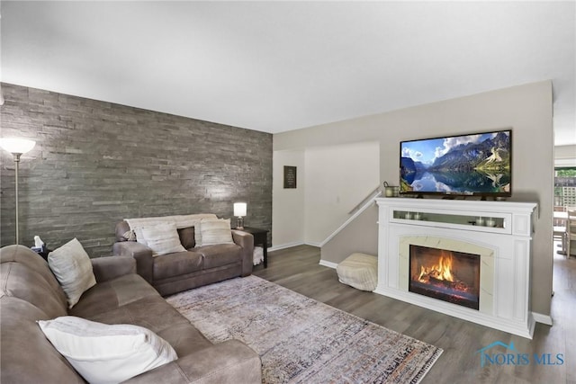 6627 Garden Rd Unit 6627, Maumee, OH 43537 - living room featuring wood finished floors and a high end fireplace