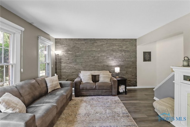 6627 Garden Rd Unit 6627, Maumee, OH 43537 - living room with dark wood-style floors and baseboards
