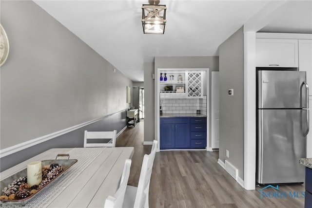 6627 Garden Rd Unit 6627, Maumee, OH 43537 - entrance foyer featuring wood finished floors and baseboards