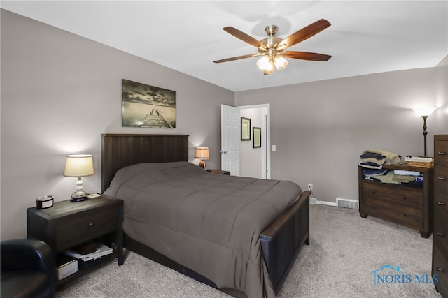6627 Garden Rd Unit 6627, Maumee, OH 43537 - bedroom featuring light colored carpet and a ceiling fan
