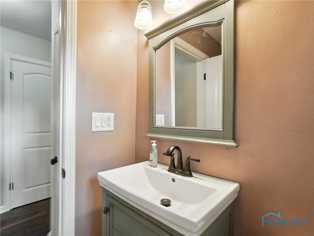 2838 Secor Rd, Toledo, OH 43606 - bathroom featuring vanity and wood finished floors