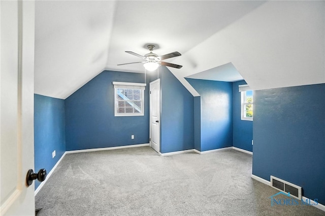 2838 Secor Rd, Toledo, OH 43606 - additional living space with carpet floors, a ceiling fan, and vaulted ceiling