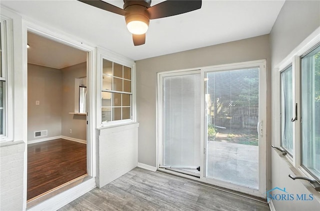 2838 Secor Rd, Toledo, OH 43606 - entryway with wood finished floors and ceiling fan