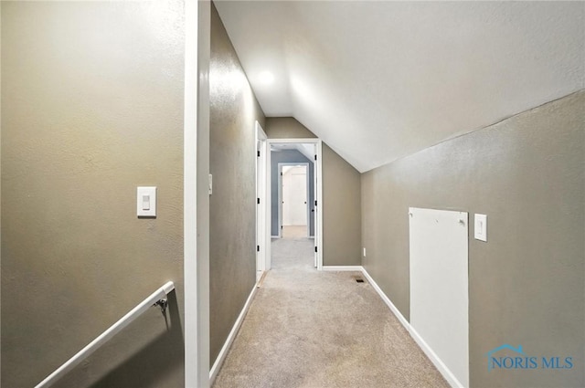 2838 Secor Rd, Toledo, OH 43606 - corridor with vaulted ceiling and carpet