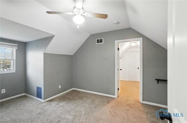 2838 Secor Rd, Toledo, OH 43606 - additional living space with carpet, vaulted ceiling, and a ceiling fan