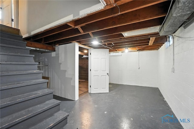 2838 Secor Rd, Toledo, OH 43606 - basement featuring stairway and concrete block wall