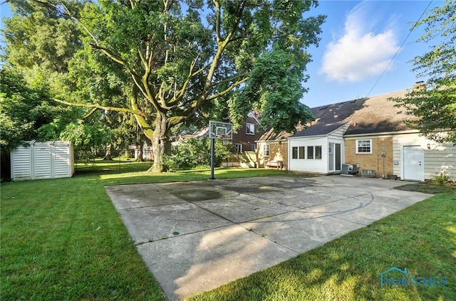 2838 Secor Rd, Toledo, OH 43606 - view of basketball court with a yard and basketball court