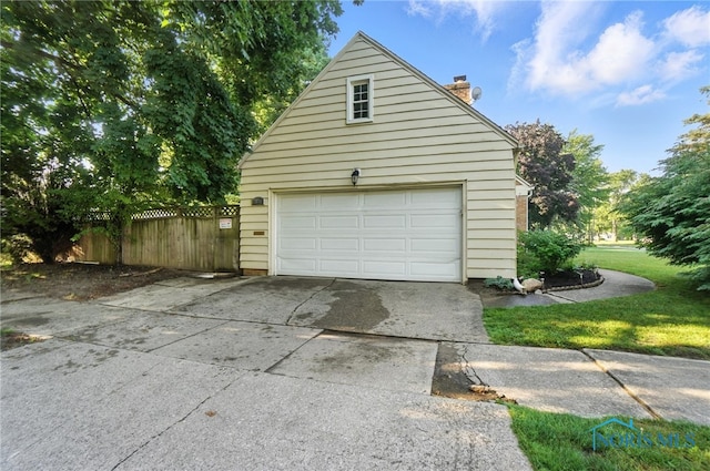 2838 Secor Rd, Toledo, OH 43606 - garage with concrete driveway