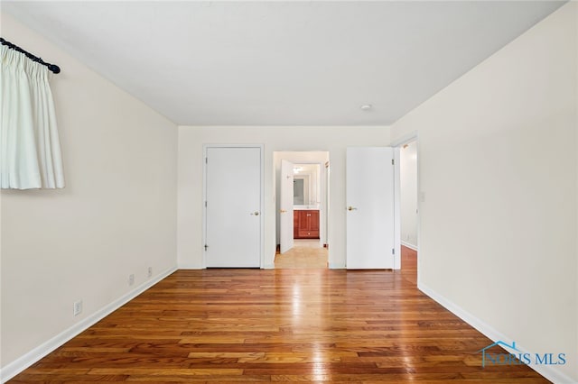 621 Bittersweet Dr, Findlay, OH 45840 - unfurnished room featuring wood finished floors and baseboards