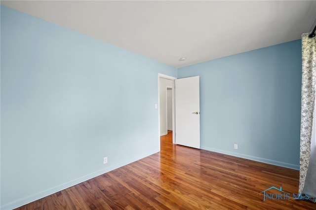 621 Bittersweet Dr, Findlay, OH 45840 - unfurnished room with wood finished floors