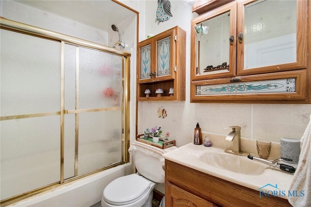 3867 Almeda Dr, Toledo, OH 43612 - bathroom featuring vanity, enclosed tub / shower combo, and backsplash