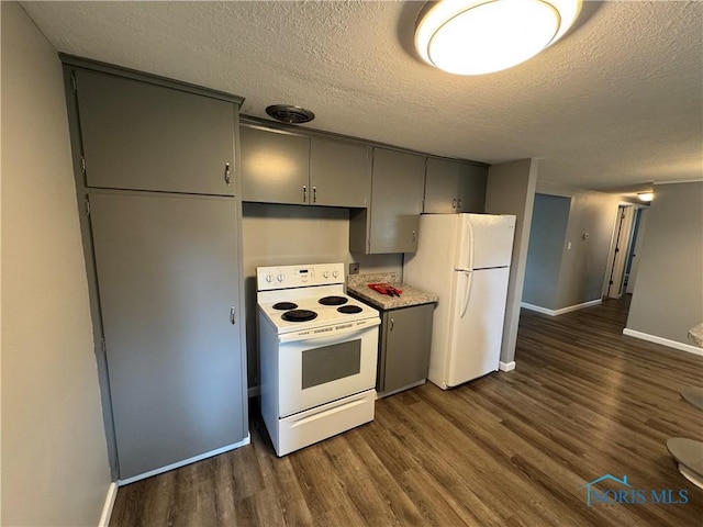 1712 Maumee Dr, Defiance, OH 43512 - kitchen featuring white appliances, gray cabinets, a textured ceiling, dark wood-type flooring, and light countertops