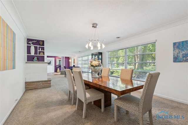 3468 Hughes Blvd, Toledo, OH 43606 - dining room featuring a chandelier and carpet