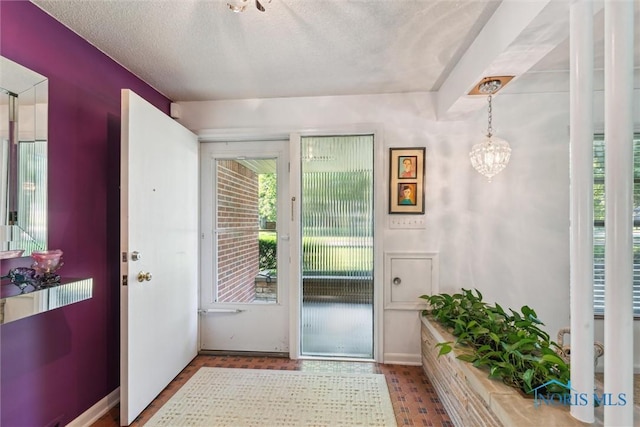 3468 Hughes Blvd, Toledo, OH 43606 - entryway with a chandelier and a textured ceiling