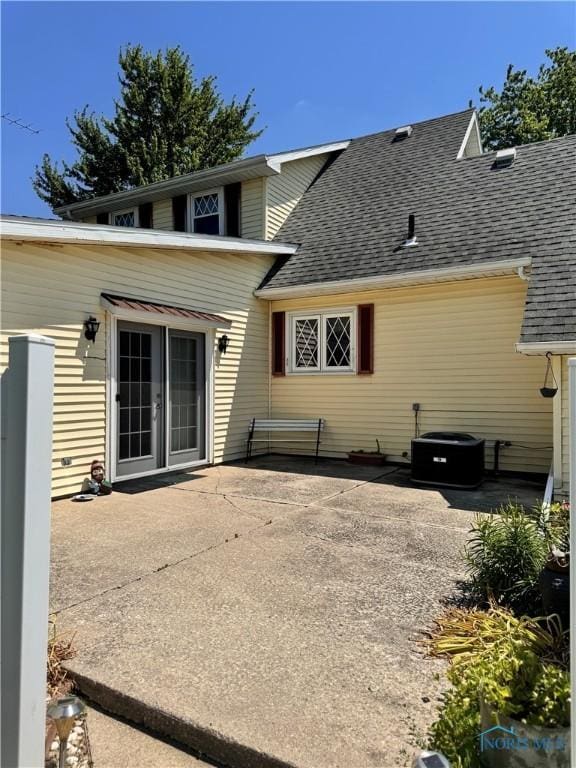 8320 Openlander Rd, Sherwood, OH 43556 - rear view of property featuring a patio area and roof with shingles