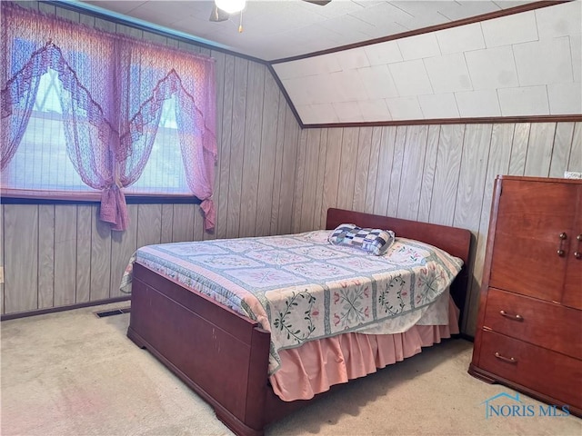 8320 Openlander Rd, Sherwood, OH 43556 - bedroom featuring carpet flooring, wood walls, lofted ceiling, and ceiling fan