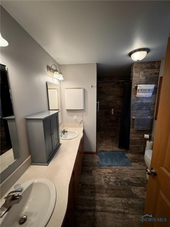 110 Town Line Rd, Bryan, OH 43506 - full bathroom featuring a tile shower and double vanity