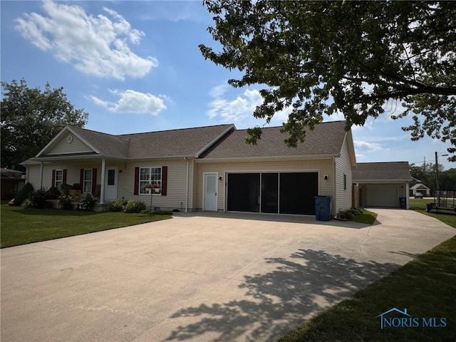 110 Town Line Rd, Bryan, OH 43506 - ranch-style home with a garage, driveway, a front lawn, and roof with shingles