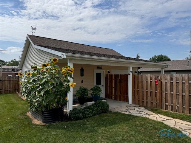 110 Town Line Rd, Bryan, OH 43506 - rear view of house featuring a shingled roof