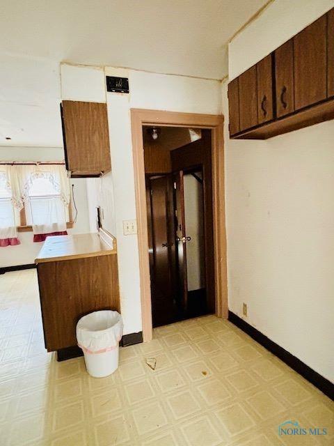 4136 Berwick Ave, Toledo, OH 43612 - kitchen featuring light flooring and baseboards