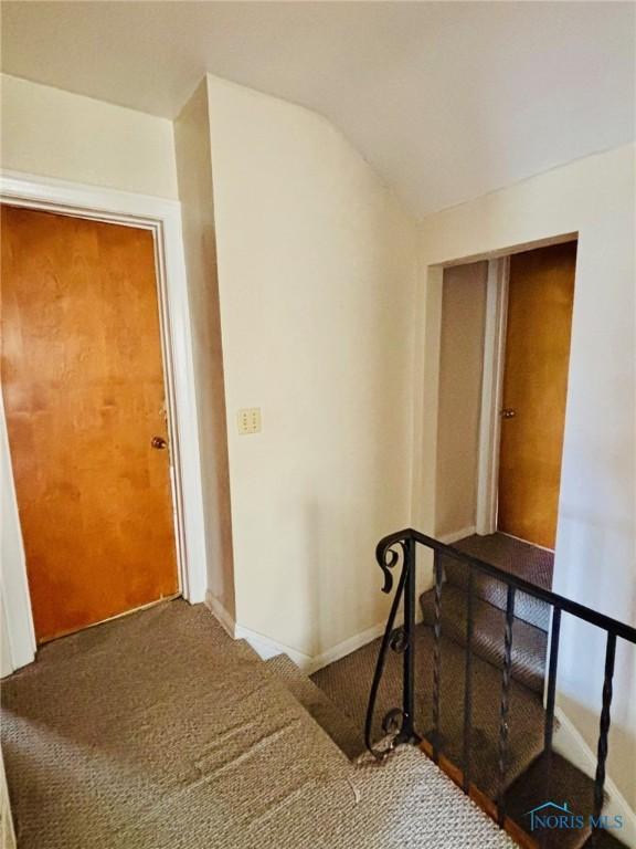 4136 Berwick Ave, Toledo, OH 43612 - corridor with carpet and vaulted ceiling