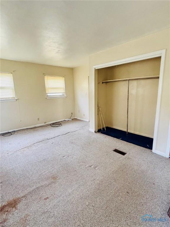4136 Berwick Ave, Toledo, OH 43612 - unfurnished bedroom featuring a closet and carpet