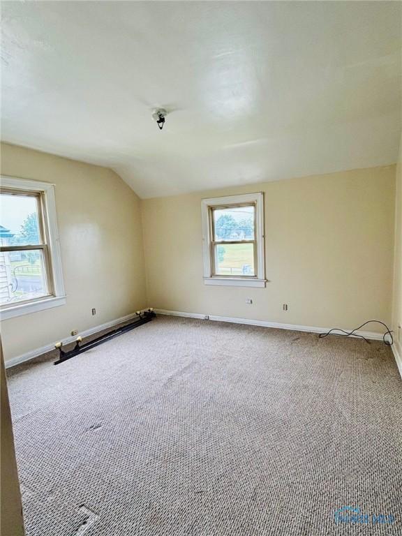 4136 Berwick Ave, Toledo, OH 43612 - bonus room featuring carpet, healthy amount of natural light, and lofted ceiling