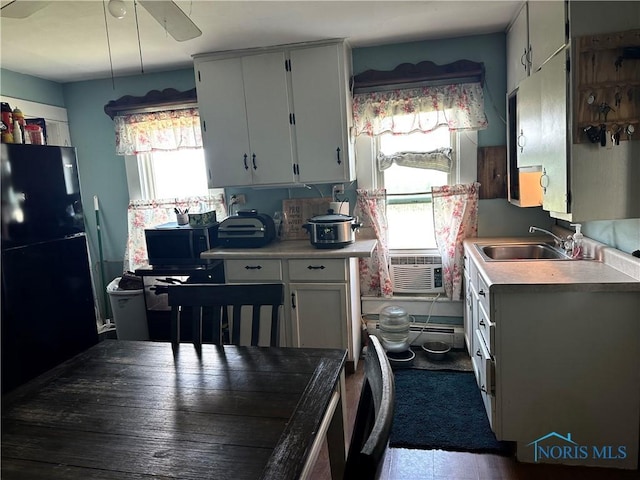 11080 Rd 21, Antwerp, OH 45813 - kitchen featuring black appliances, cooling unit, and light countertops