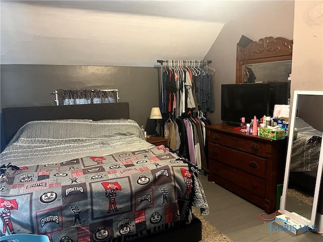 11080 Rd 21, Antwerp, OH 45813 - bedroom featuring vaulted ceiling and wood finished floors