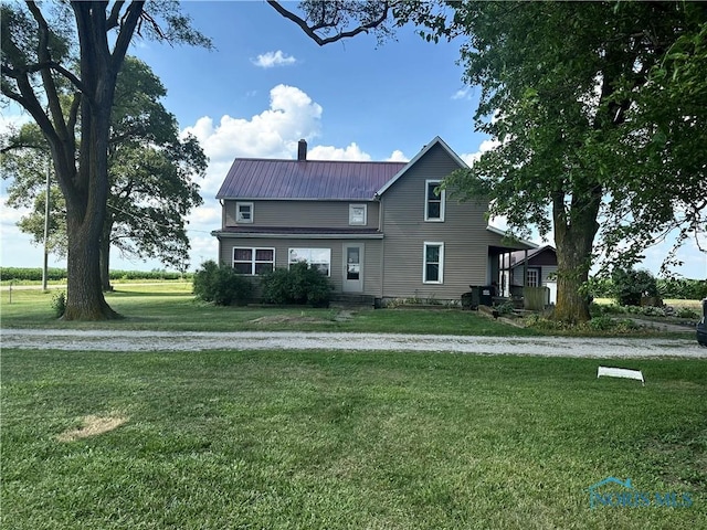 11080 Rd 21, Antwerp, OH 45813 - view of front of property with a front yard and a metal roof